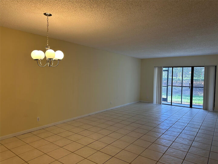 Property Photo:  310 Racquet Club Road 103  FL 33326 