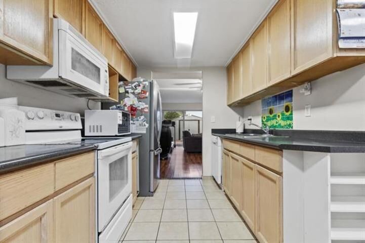 Property Photo:  7453 140 Street 223  BC V3W 6G5 
