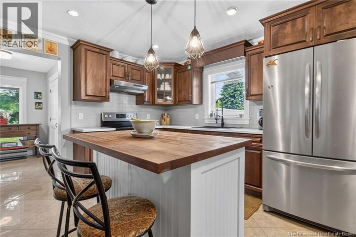 Property Photo: 24 Des Roches Street NB E4S 3B4