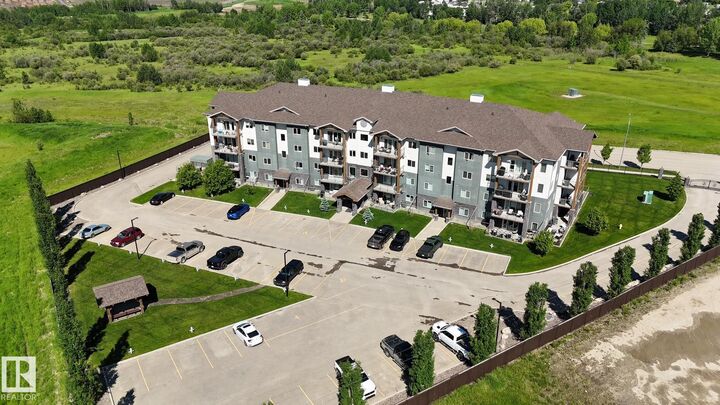 Property Photo: 5201 Brougham Drive 204 AB T7A 0C8