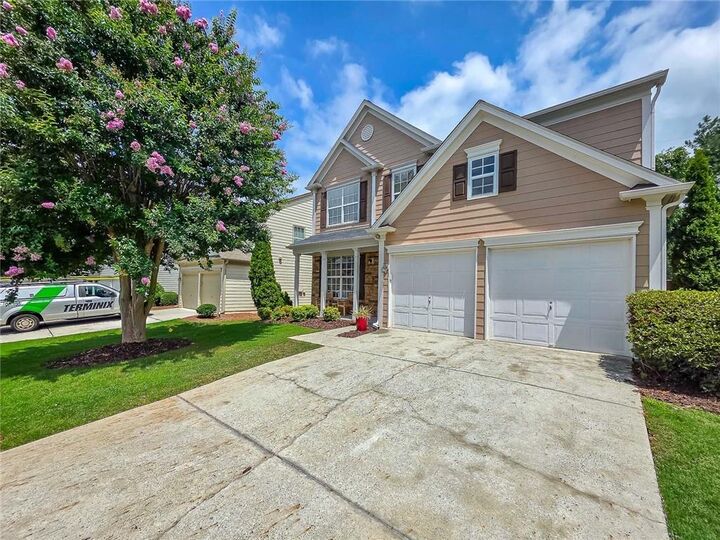 Property Photo: 9025 Friarbridge Drive GA 30024