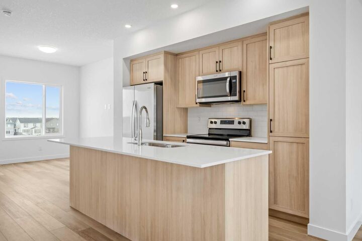 Property Photo: 25 Wildwoods Court SW 1408 AB T4B 5V7