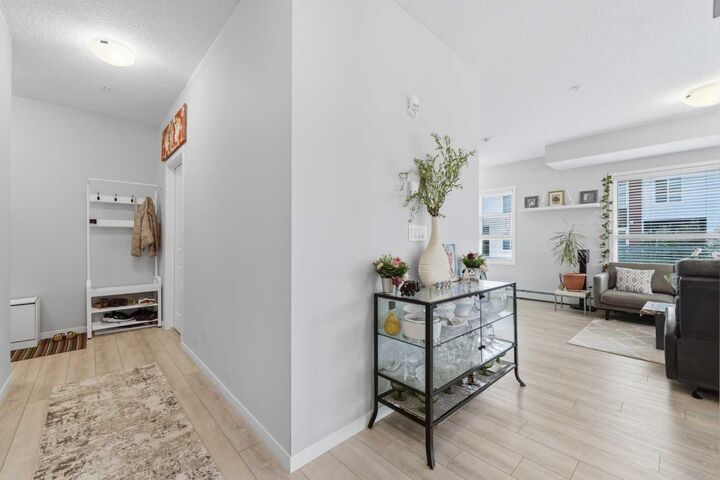 Property Photo: 370 Harvest Hills Common NE 210 AB T3K 2M8