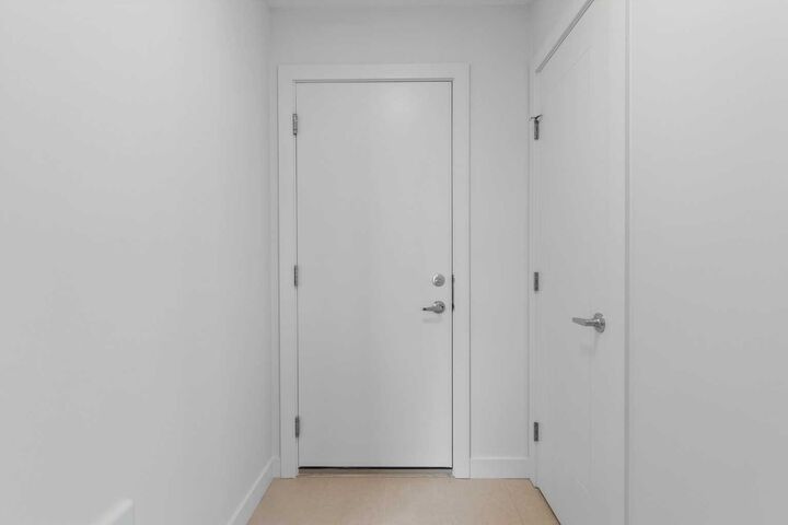 Property Photo: 132 Quesnay Wood Link SW AB T3E 8H6