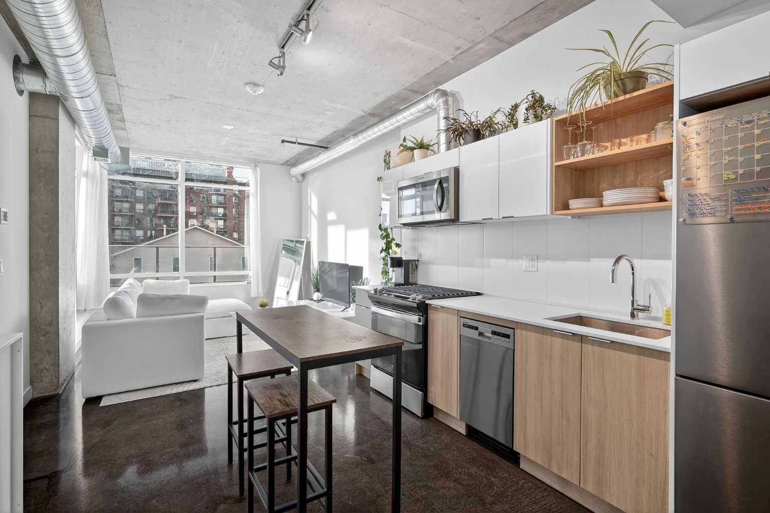 Property Photo: 1319 14 Avenue SW 203 AB T3C 0W3