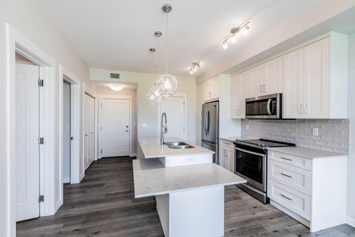 Property Photo:  300 Auburn Meadows Common SE 111  AB T3M 3E7 