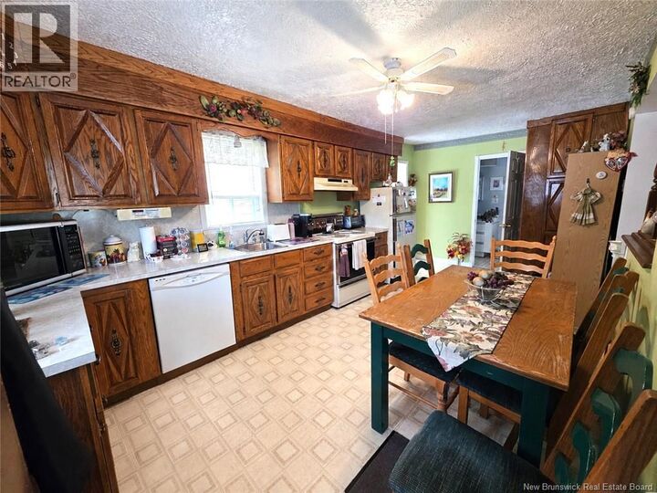 Property Photo:  460 Canada Road  NB E3V 1W4 
