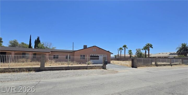 Property Photo:  5785 West Russell Road  NV 89118 