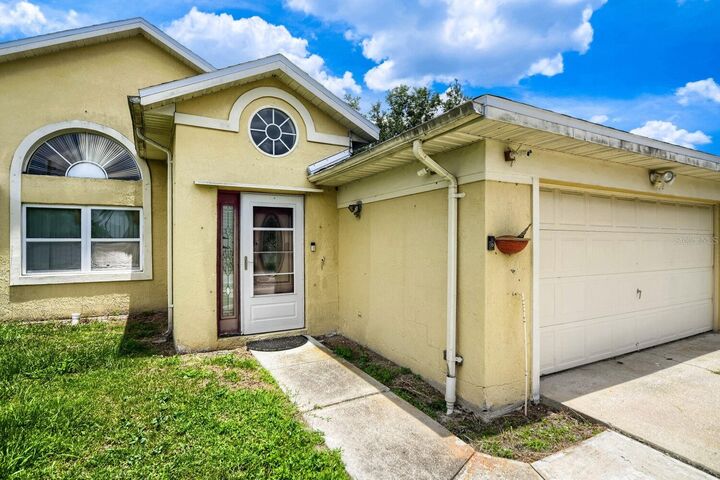 Property Photo: 102 Carlisle Court FL 34758