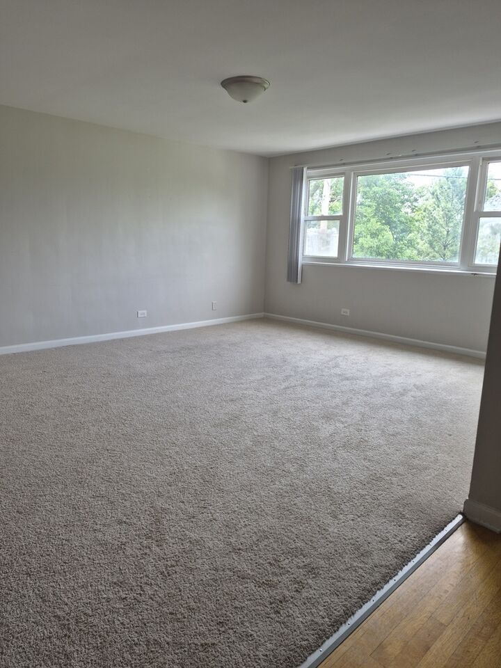 Property Photo: 4949 Church Street 301 IL 60077