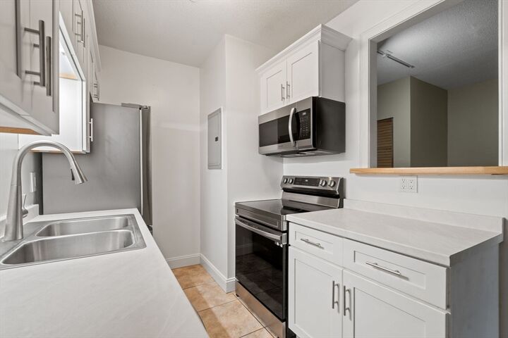 Property Photo:  150 Rumford Ave 230  MA 02048 