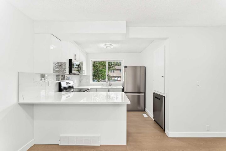 Property Photo:  7205 4 Street NE 12  AB T2K 5S3 
