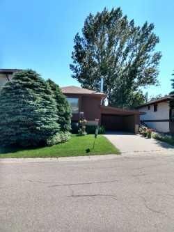Property Photo: 100 Doverglen Crescent SE AB T2B 2P6