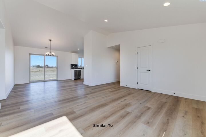 Property Photo:  10115 Redbud Dr  WA 99301 