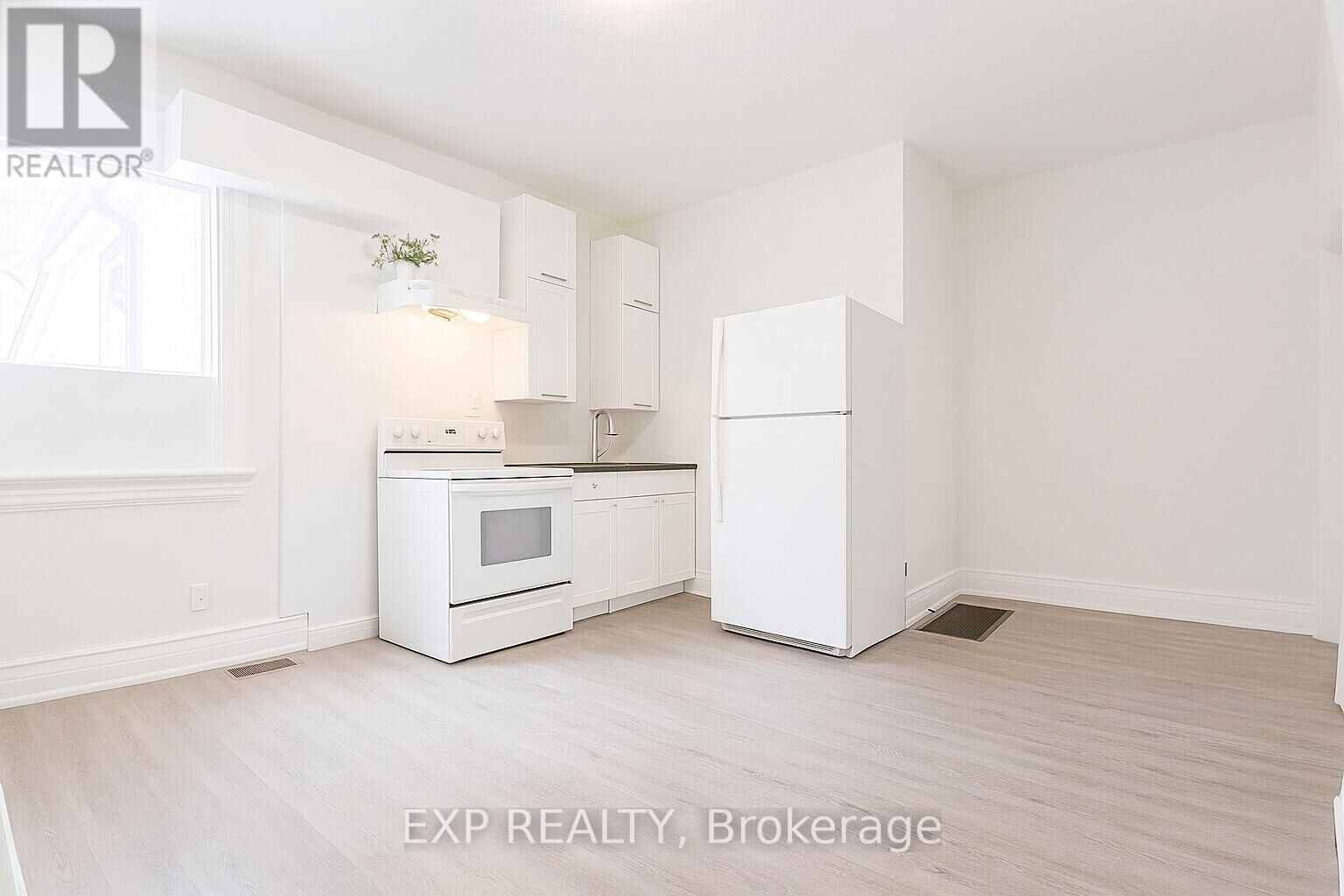 Property Photo:  207 Gamble Avenue Main  ON M4J 2P4 