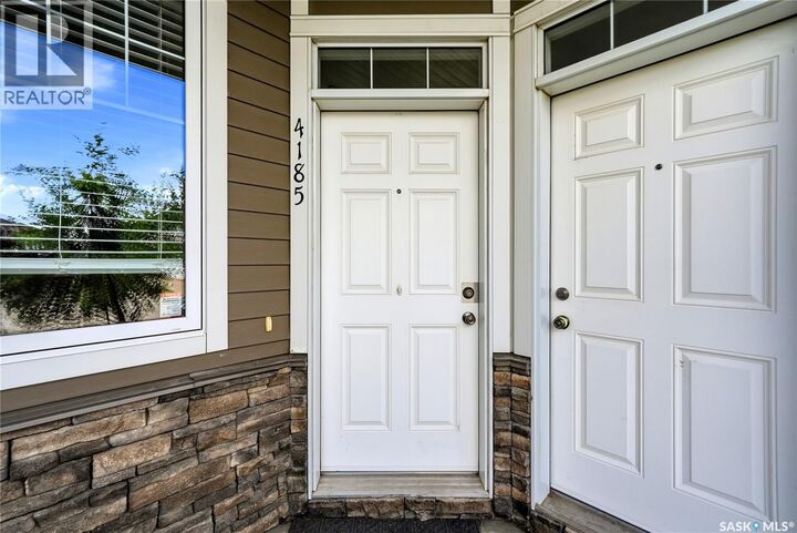 Property Photo:  4185 Green Apple Drive E  SK S4V 1S1 