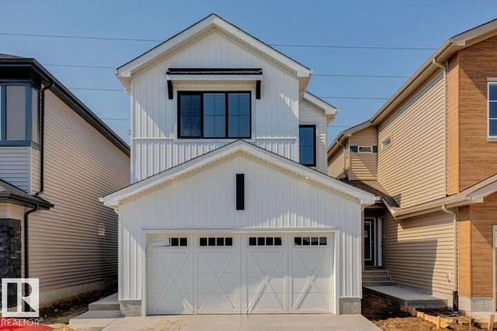 Property Photo: 17320 5 Street NW AB T5Y 6G4