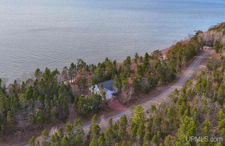 Property Photo:  5877 Five Mile Point Road  MI 49805 