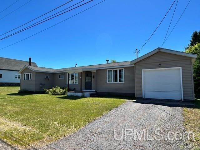 Property Photo:  124 Stanton Avenue  MI 49950 