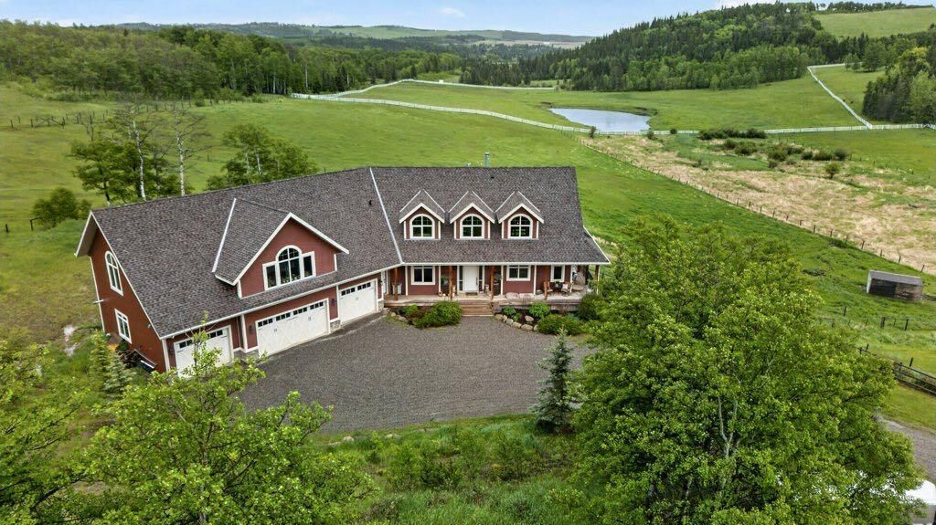 Property Photo: 274136 272 Street W AB T2J 2T9