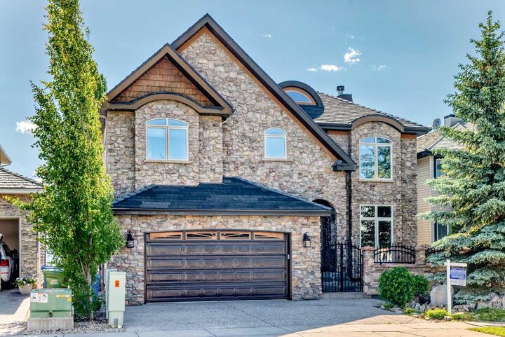 Property Photo: 423 Rocky Ridge Drive NW AB T3G 5C2