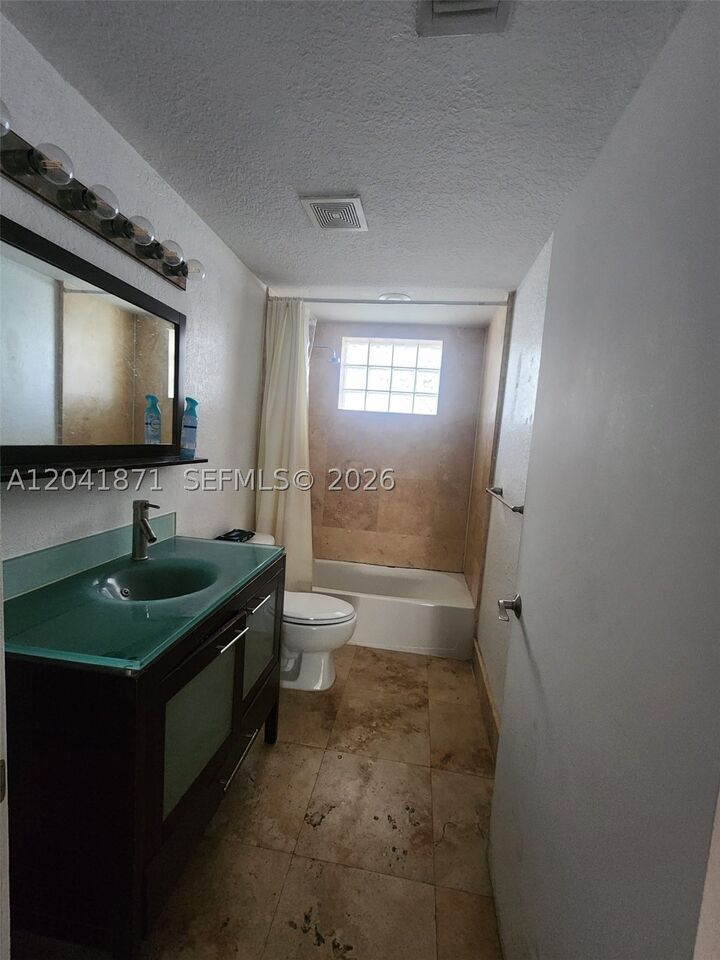 Property Photo: 1080 99th St 212 FL 33154