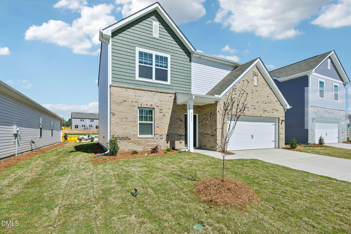 Property Photo:  216 Tar Banks Drive  NC 27549 