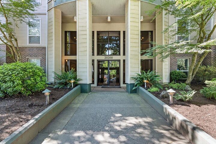 Property Photo: 20200 54A Avenue 209 BC V3A 3W7