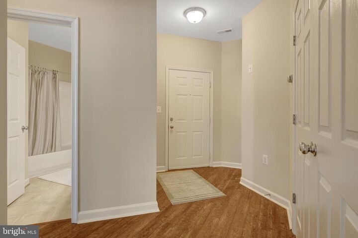 Property Photo:  22710 Blue Elder Terrace 203  VA 20148 