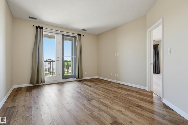Property Photo:  6083 Maynard Way NW 312  AB T6R 0S5 