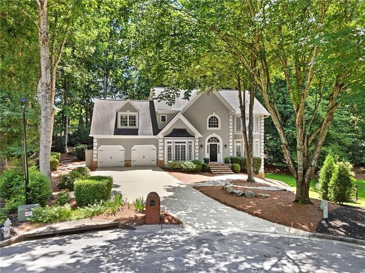 Property Photo:  345 Kestrel Cove  GA 30022 