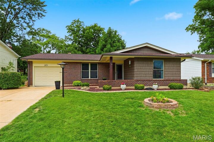 Property Photo:  2451 Wesbay Drive  MO 63043 