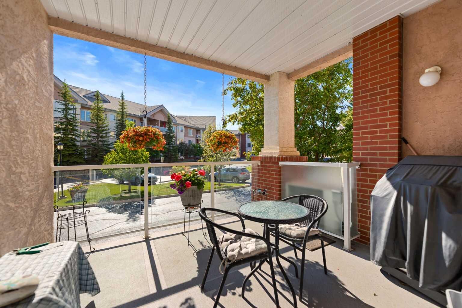Property Photo:  223 Tuscany Springs Boulevard NW 117  AB T3L 2M2 