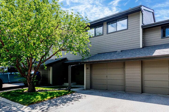 Property Photo:  5019 46 Avenue SW 50  AB T3E 6R1 