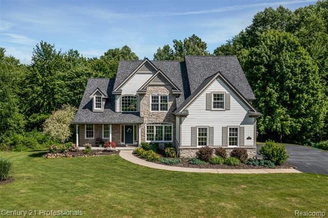 Property Photo:  8928 Wild Iris Court  MI 48350 