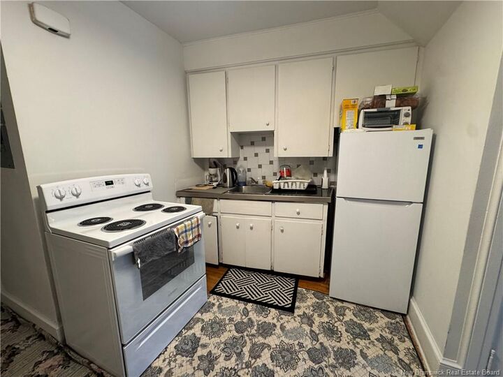 Property Photo: 325 Main Street NB E2K 1H7