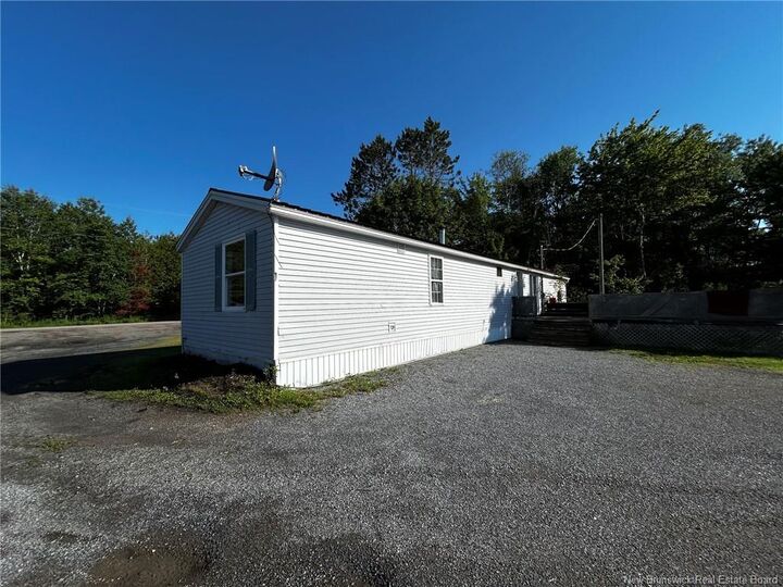 Property Photo:  70 Canal Road  NB E5C 1K1 