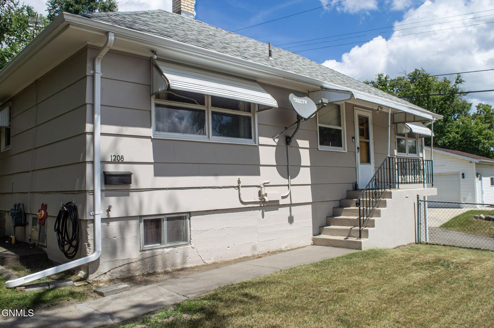 Property Photo:  1208 Avenue B E  ND 58501 
