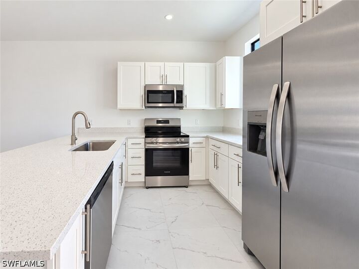 Property Photo: 4812/4814 30th Street SW FL 33973
