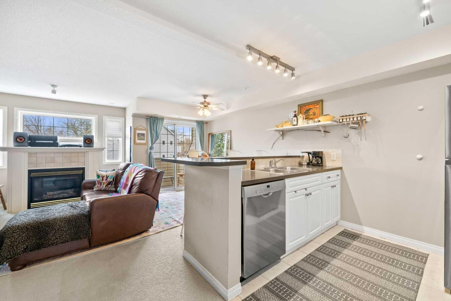 Property Photo: 45 N Railway Street 207 AB T1S 1J3