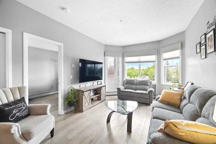 Property Photo: 8 Prestwick Pond Terrace SE 220 AB T2Z 4P3