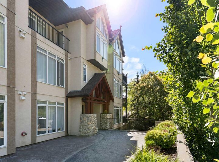 Property Photo: 141 Mountain Street 202 AB T4C 1Z5