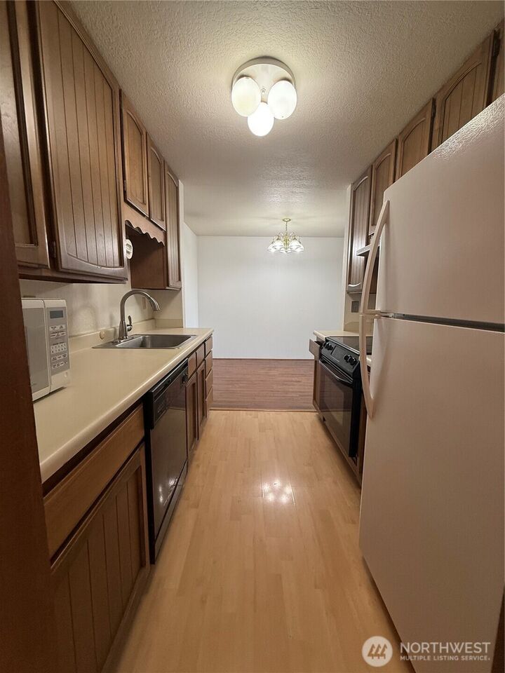 Property Photo:  12035  32nd Avenue W 302  WA 98125 