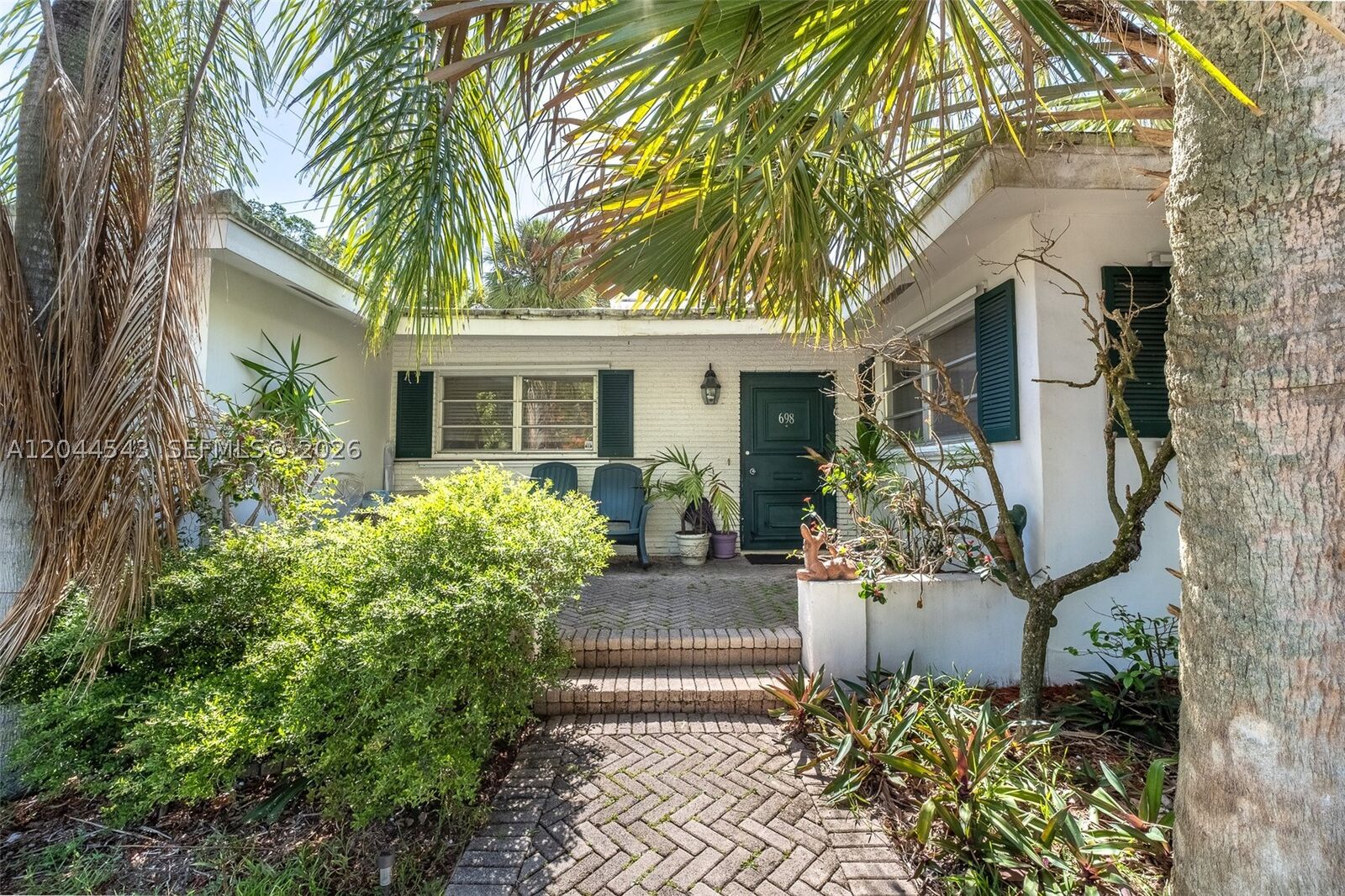 Property Photo: 698 NW 7th Ave FL 33486