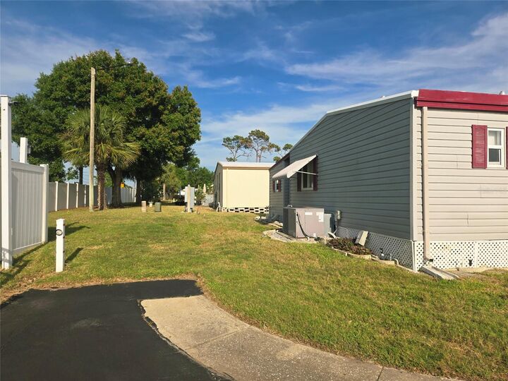 Property Photo:  39820 US Highway 19 N 212  FL 34689 