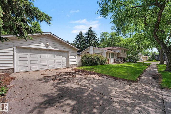 Property Photo: 14703 65 Street NW AB T5A 2C9