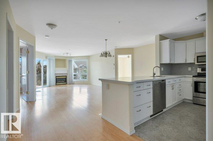 Property Photo: 7839 96 Street NW 305 AB T6C 4R4