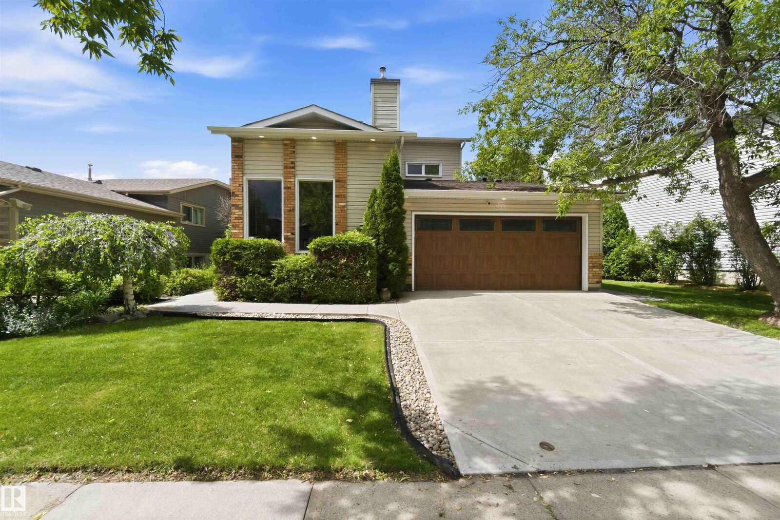 Property Photo: 50 Patterson Cr AB T8N 4T7