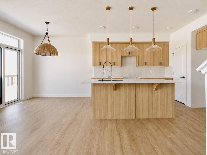 Property Photo: 2211 Crossbill Link NW AB T5S 0W3