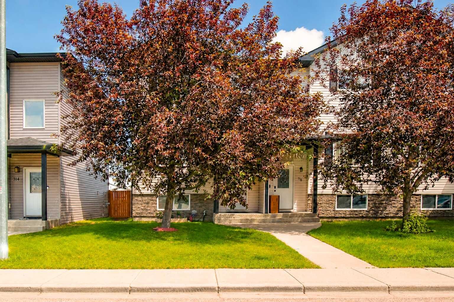 Property Photo: 312 17 Street E AB T1R 1R2